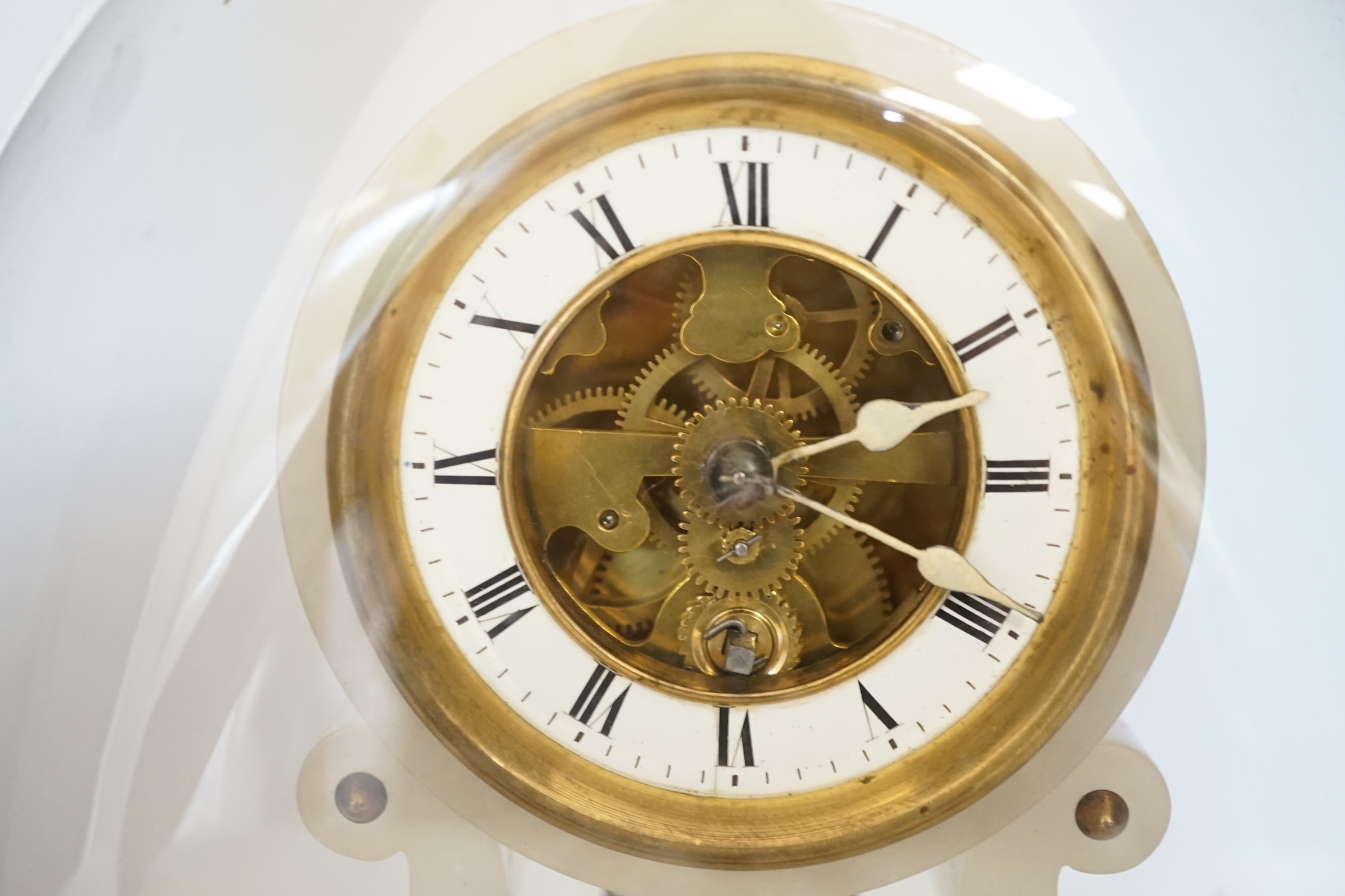 A 19th century French alabaster mantel clock under dome, 32cm total. Condition - fair to good